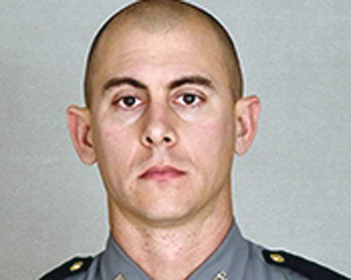 This undated photo provided by the Kentucky State Police shows Trooper Joseph Cameron Ponder. 