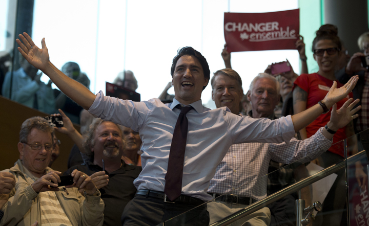Liberal Leader Justin Trudeau reacts to the crowd as he arrives at a campaign stop in Orleans, Ont., on Sept. 21, 2015.