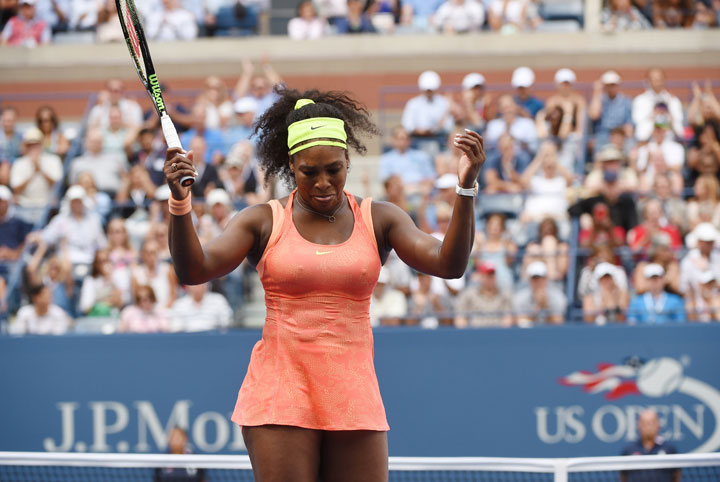 Serena Williams of the US reacts to a point while playing Roberta Vinci of Italy during their US Open 2015 women's singles semifinals match at the USTA Billie Jean King National Center September 11, 2015 in New York.