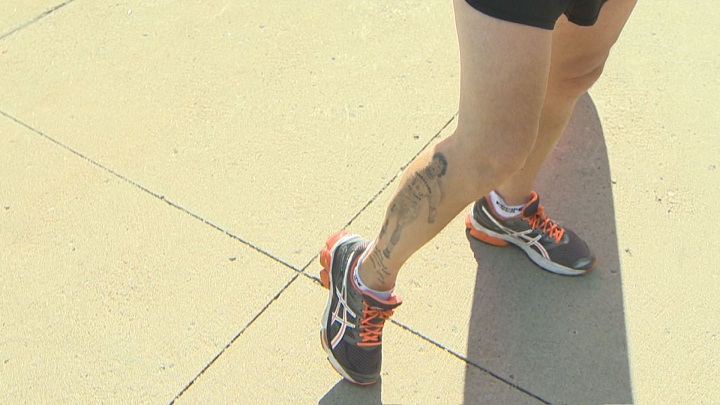 Eddy Nolan proudly shows off his Terry Fox tattoo, at the annual Terry Fox run at the Old Port in Montreal. Sunday, Sept. 20, 2015.