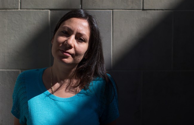 Syrian refugee Mai Eilia, who came to Canada in 2013, stands for a photograph in Vancouver, B.C., on Friday September 11, 2015.