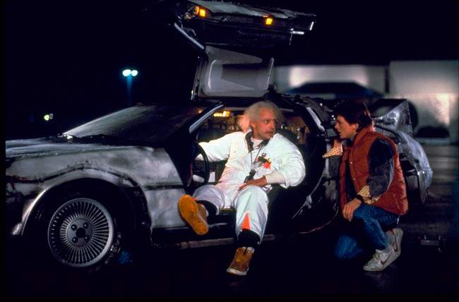 Christopher Lloyd, left, as Dr. Emmett Brown, and Michael J. Fox as Marty McFly in "Back to the Future.".