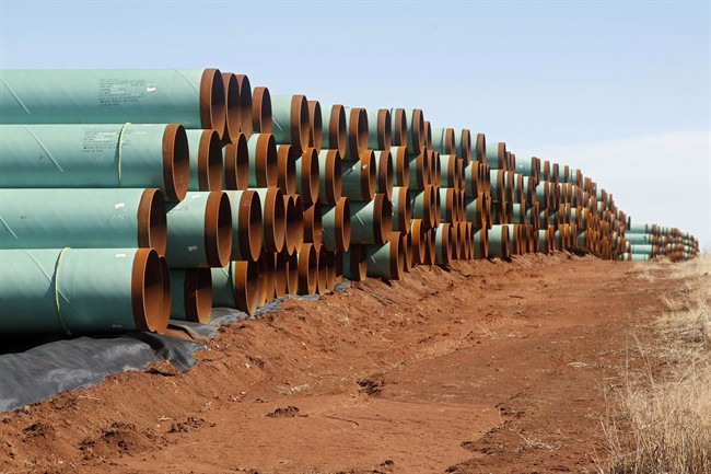 Miles of pipe for the stalled Canada-to-Texas Keystone XL pipeline are stacked in a field near Ripley, Okla.,.