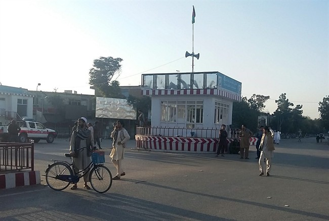 Afghans walk in the main square of Kunduz city, north of Kabul, Afghanistan, Thursday, Oct. 1, 2015. An Afghan official says government forces have retaken the strategic northern city of Kunduz, which was seized by the Taliban on Monday. The spokesman says it could take some days to "clear the city," but that Taliban forces have retreated. He says about 200 Taliban fighters have been killed. (AP Photo).