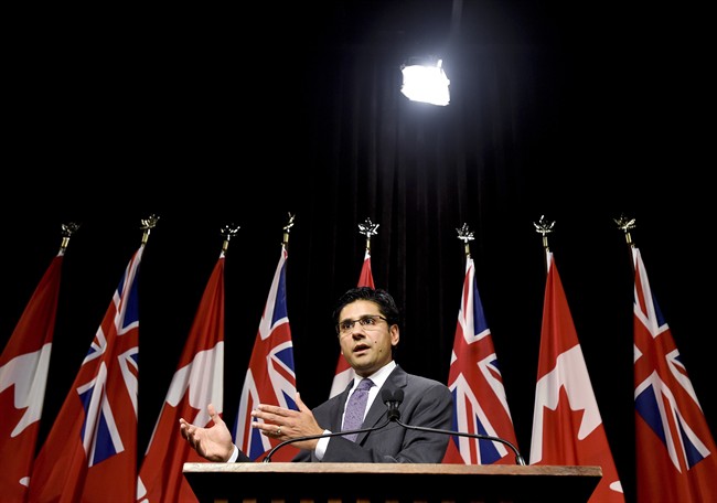 Yasir Naqvi, Ontario Minister of Community Safety and Correctional Services, explains a draft regulation for public input that would prohibit the random and arbitrary collection of identifying information by police, referred to as carding or street checks at Queen's Park in Toronto on Wednesday, October 28, 2015.