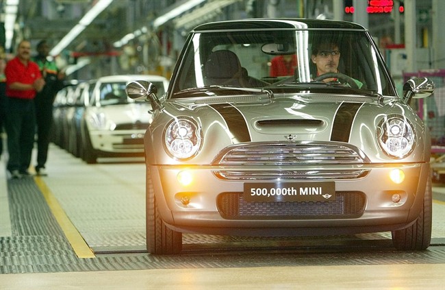 In this Aug. 25, 2004 file photo, the 500,000th Mini is driven off the production line at BMW Group Plant in Oxford, England. The Mini Cooper is among the top 10 stolen vehicles in Atlantic Canada.
