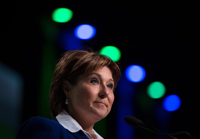 British Columbia Premier Christy Clark pauses while addressing the LNG in BC Conference in Vancouver, B.C., on Wednesday October 14, 2015. 