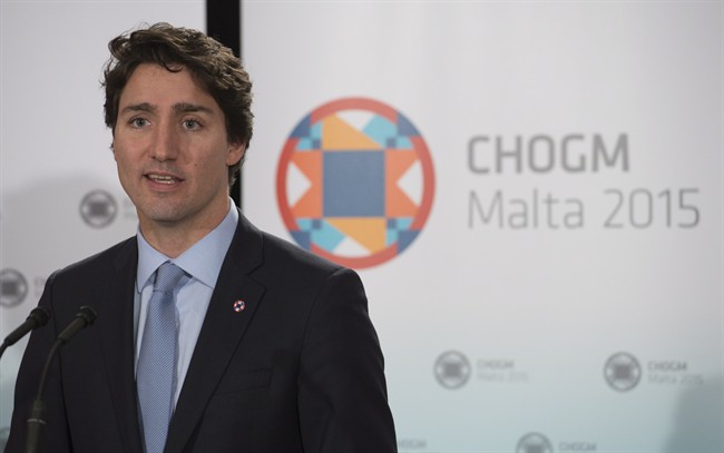 Canadian Prime Minister Justin Trudeau speaks with the media following the Commonwealths Heads of Government meeting in Valletta, Malta Saturday, November 28, 2015. 