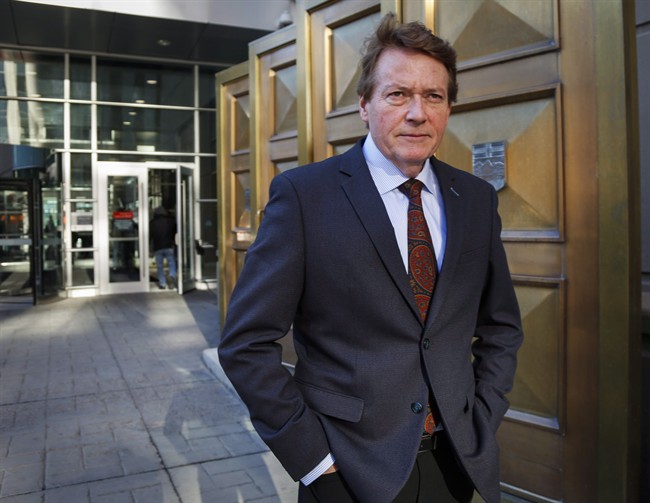 Former TV journalist Arthur Kent outside court during his lawsuit against Postmedia and other individuals related to a 2008 column.