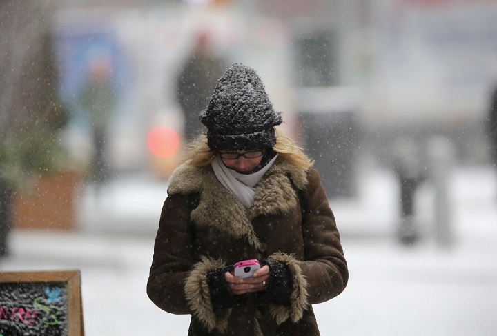 While it's a good idea to keep your head warm, it's more important that you keep your core heated.