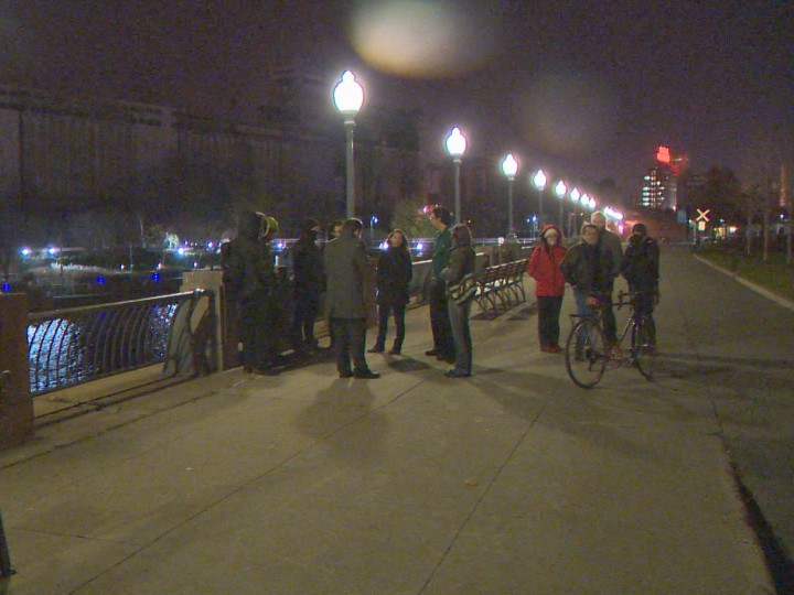 Protesters against the Saint-Lawrence sewage dump start to gather, Tuesday, November 10, 2015.