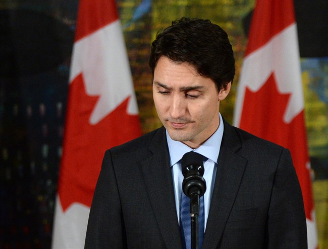 Canadian Prime Minister Justin Trudeau pauses as he addresses the media on the terrorist attacks in Paris prior to his departure for the G20 and APEC summits from Ottawa, Friday November 13, 2015. Trudeau says Canada has offered all the support it can to France following Friday’s attacks in Paris. THE CANADIAN PRESS/Sean Kilpatrick