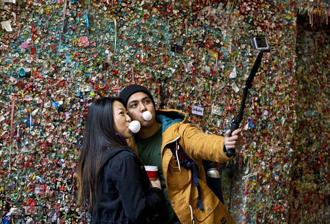 For some travellers, the selfie stick just isn't cutting it. They're willing to pay big bucks to get a pro to photograph them on vacation.