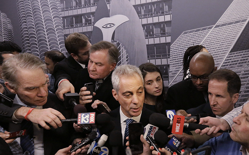 Chicago Mayor Rahm Emanuel speaks to the media, in Chicago. Chicago officials released hundreds of emails Thursday Dec. 31, 2015 related to a video showing a white police officer shooting a black teenager 16 times that wasn't released until more than a year after the shooting. 