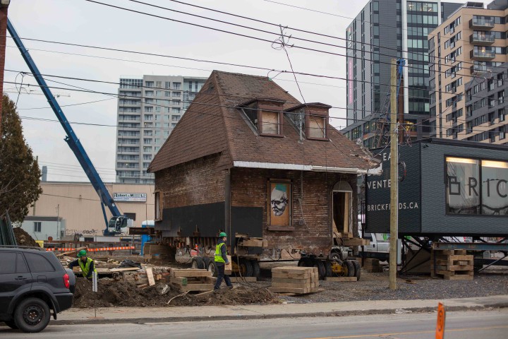 La Maison Keegan is being dug up and moved to make way for a condo project in Griffintown, Montreal, December 9, 2015.
