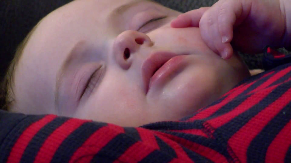 Shh! Baby and Santa take a nap during photo, picture goes viral - image