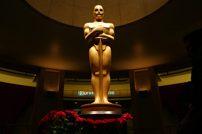 This file photo shows an Oscar statue as preparations are made for the 87th Academy Awards in Los Angeles. 