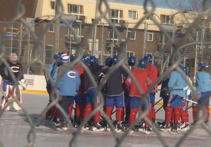 The Montreal Canadiens gather for a rare outdoor practice at the foundation's seventh outdoor ice rink at Parc Émile in Laval, Monday, January 11, 2016.