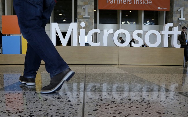 Microsoft president Brad Smith said the company 'wholeheartedly' supports Apple in the debate over hacking an iPhone.