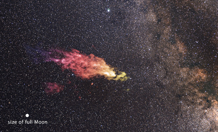 This composite image shows the size and location of the Smith Cloud on the sky. The cloud appears in false-color, radio wavelengths as observed by the Green Bank Telescope in West Virginia. 
