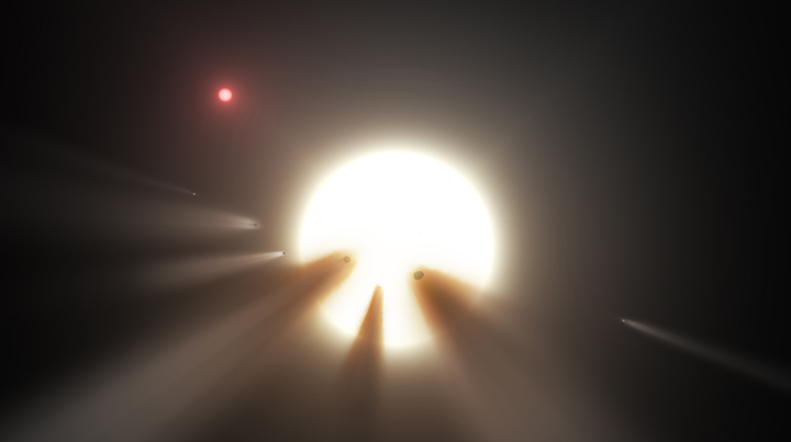 An illustration of a star surrounded by pieces of a shattered comet.