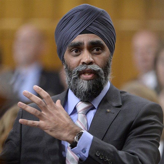 Minister of National Defence Minister Harjit Sajjan responds to a question during question period in the House of Commons Thursday February 18, 2016 in Ottawa. 