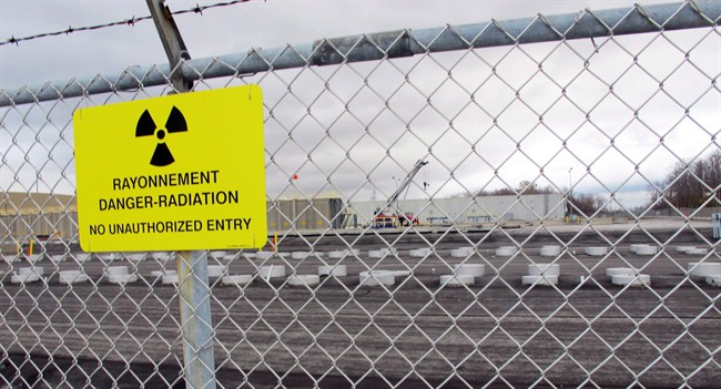 This Nov. 1, 2013 photo shows rows of chambers holding intermediate-level radioactive waste in shallow pits at the Bruce Power nuclear complex near Kincardine, Ontario. 