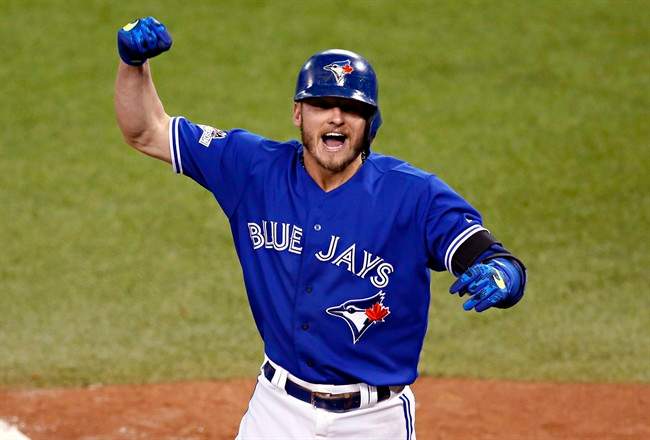 In this Oct. 19, 2015, file photo, Toronto Blue Jays' Josh Donaldson celebrates his two run home run against the Kansas City Royals during the third inning in Game 3 of baseball's American League Championship Series in Toronto.