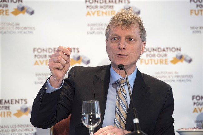 Treasury Board President Roger Melanson, speaks to the media on February 2, 2016 when he served as Finance Minister.