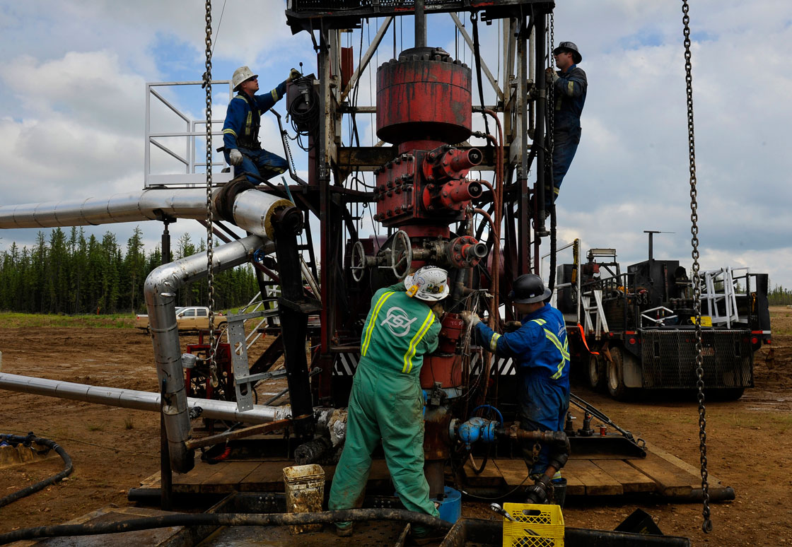 Saskatchewan Premier Brad Wall says plenty of jobs could be created by redeploying laid-off oil and gas workers to clean up defunct wells. 