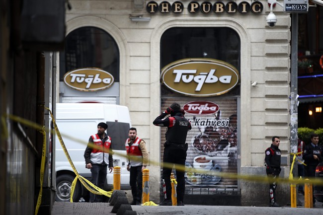 Security officials seen at the site after an explosion on a street, in Istanbul, Turkey, Saturday, March 19, 2016. An explosion on Istanbul’s main pedestrian shopping street on Saturday has killed a number of people and injured over a dozen others.
