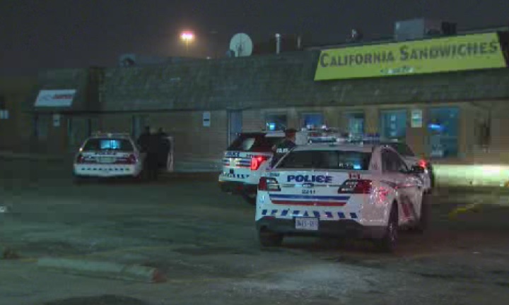 Police investigate a break-and-enter at a restaurant in west-end Toronto on March, 7, 2016.