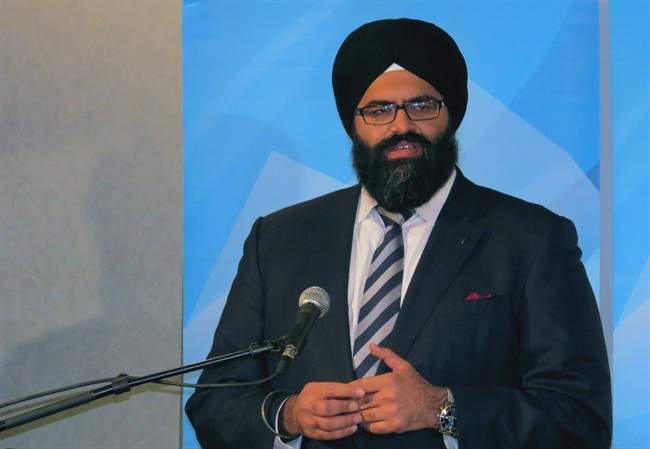 Manmeet Bhullar at a press conference in Edmonton on Jan. 8, 2014. 