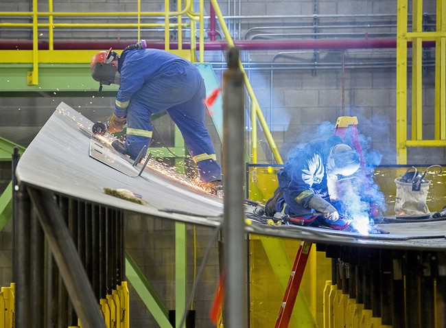 Halifax-based Irving Shipbuilding says it is in talks with the federal government over a looming gap in construction of two new fleets of ships for the navy, which the company warns could result in "significant layoffs" if left unaddressed.