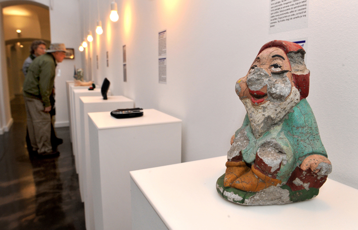 Visitors look at items presented during the opening of the Museum of Broken Relationships in Zagreb, on October 6, 2010.