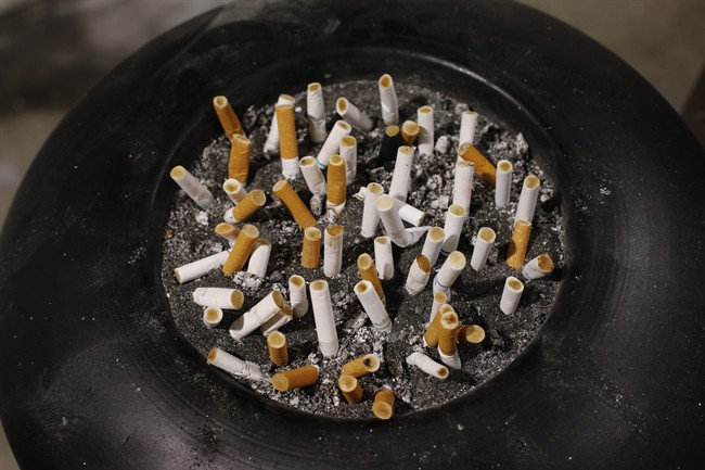 Smoked cigarettes in an ash tray.