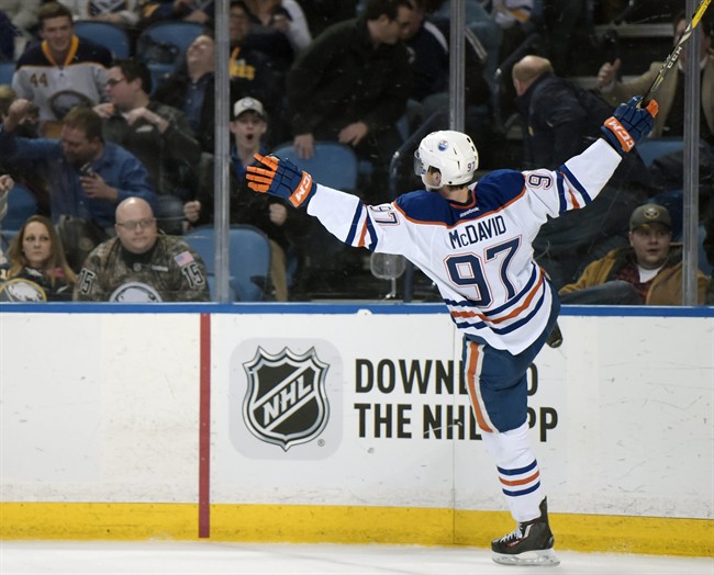 Edmonton Oilers center Connor McDavid celebrates his overtime goal against the Buffalo Sabres in an NHL hockey game Tuesday, March 1, 2016, in Buffalo, N.Y. Edmonton won 2-1.