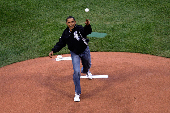 U.S. President Barack Obama throws out the first pitch at the 2009 MLB All-Star Game at Busch Stadium on July 14, 2009 in St Louis, Missouri.