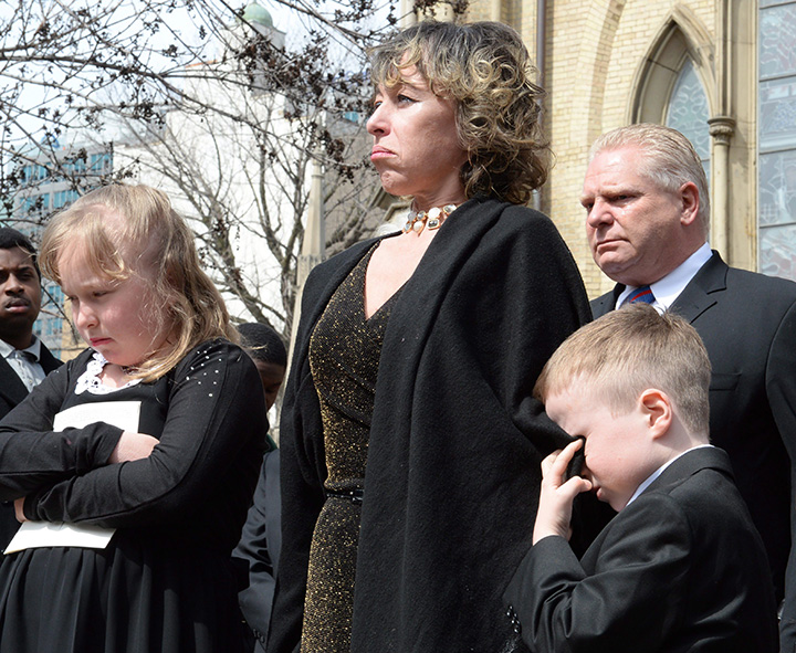 Former Toronto mayor Rob Ford’s widow, Renata, their children Stephanie and Dougie and Ford’s brother Doug, leave St. James Cathedral in Toronto following Ford’s funeral on Wednesday, March 30, 2016.