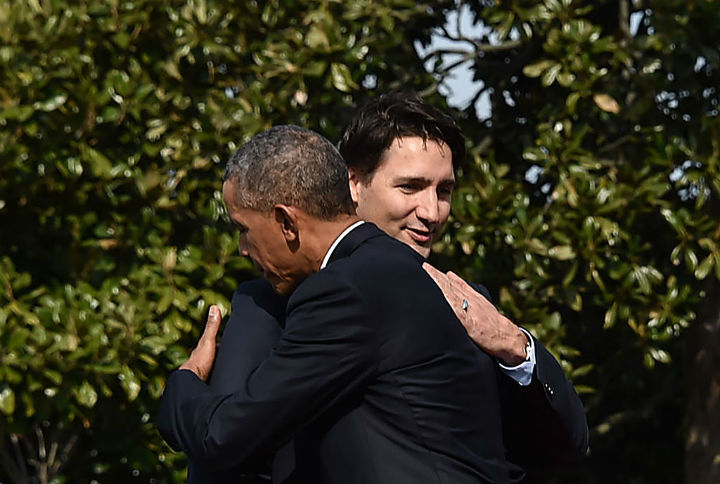 President Barack Obama and Prime Minister Justin Trudeau hug during a welcome ceremony during a State Visit at the White House on March 10, 2016 in Washington, D.C