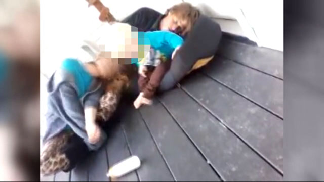 Mother arrested after video of her doing drugs in front of crying toddler goes viral - image