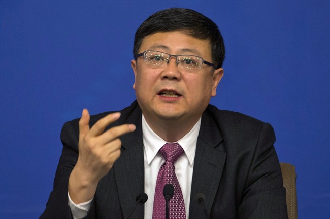 Chinese Environment Minister Chen Jining speaks during a press conference for the National People's Congress in Beijing, China, Friday, March 11, 2016. 