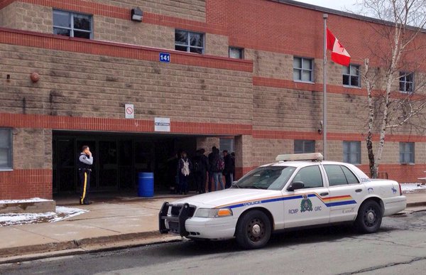 RCMP confirm they seized a bag of weapons and ammunition from the woods near Millwood High. 