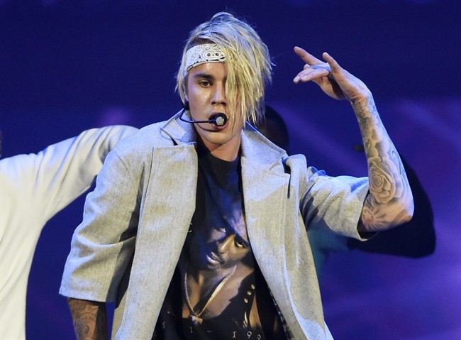 FILE - In this March 20, 2016 file photo, Justin Bieber performs during his "Purpose World Tour" in Los Angeles.