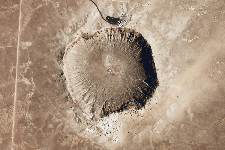 Meteor Crater is one of the youngest and best-preserved impact craters on Earth. The crater formed roughly 50,000 years ago when a 30-meter-wide, iron-rich meteor weighing 100,000 tons struck the Arizona desert at an estimated 20 kilometers per second.