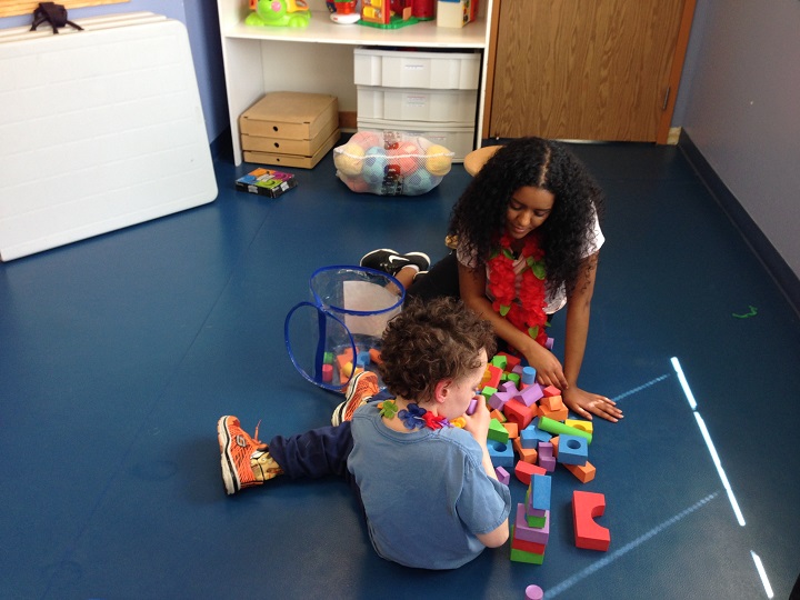 Bethel working alongside a student at the Movement Centre
