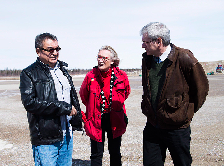 Chief Bruce Shisheesh, left, Minister of Indigenous Affairs Carolyn Bennett, centre, and Federal NDP MPP Charlie Angus, right, meet in the northern Ontario First Nations reserve in Attawapiskat, Ont., on Monday, April 16, 2016. 