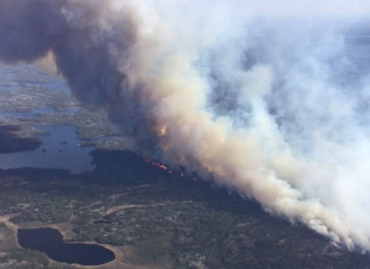 Aerial photo of wildfire burning at Caddy Lake.