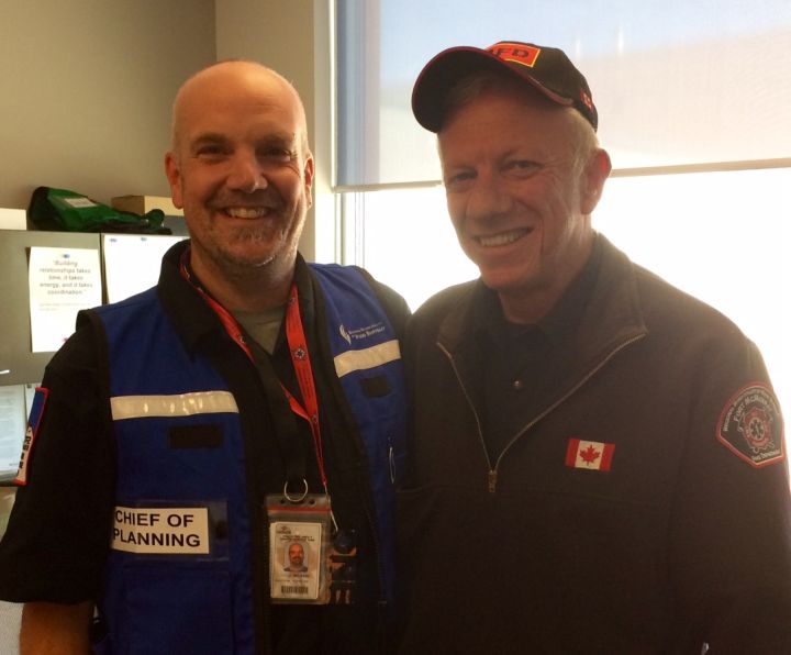 Incident Management Team member Daryl Black and Wood Buffalo Fire Chief Darby Allen.