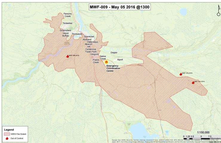 A map showing where a wildfire has spread in the Fort McMurray area as of 1 p.m. on May 5, 2016. The areas covered in lines indicate where the fire spread, the flames indicate where fire is out of control.